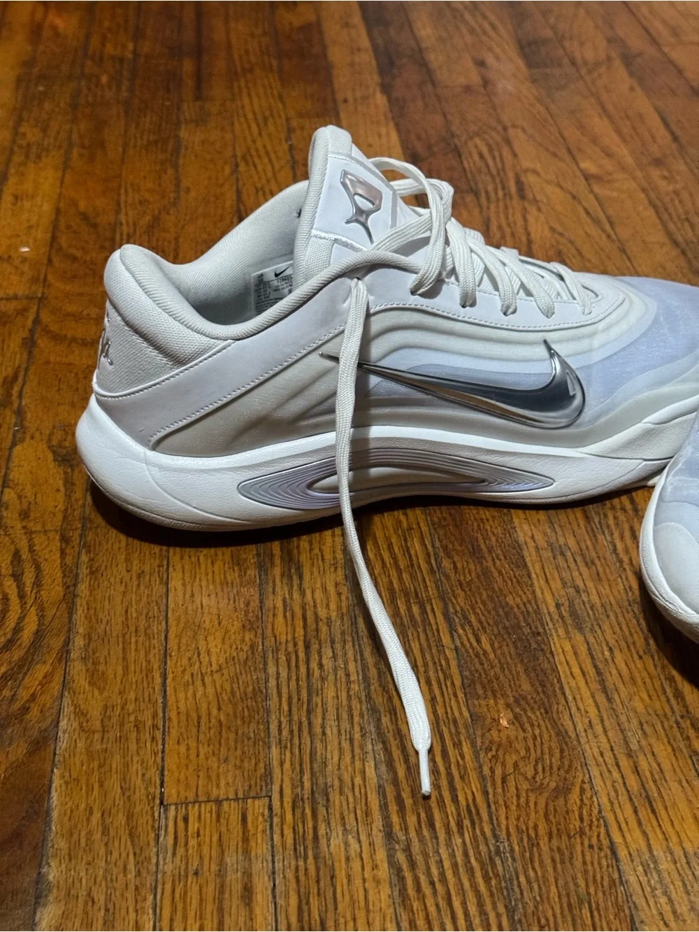 Nike A’ja Wilson A’one OG White Sneakers with Silver Swoosh. FZ8605-100
